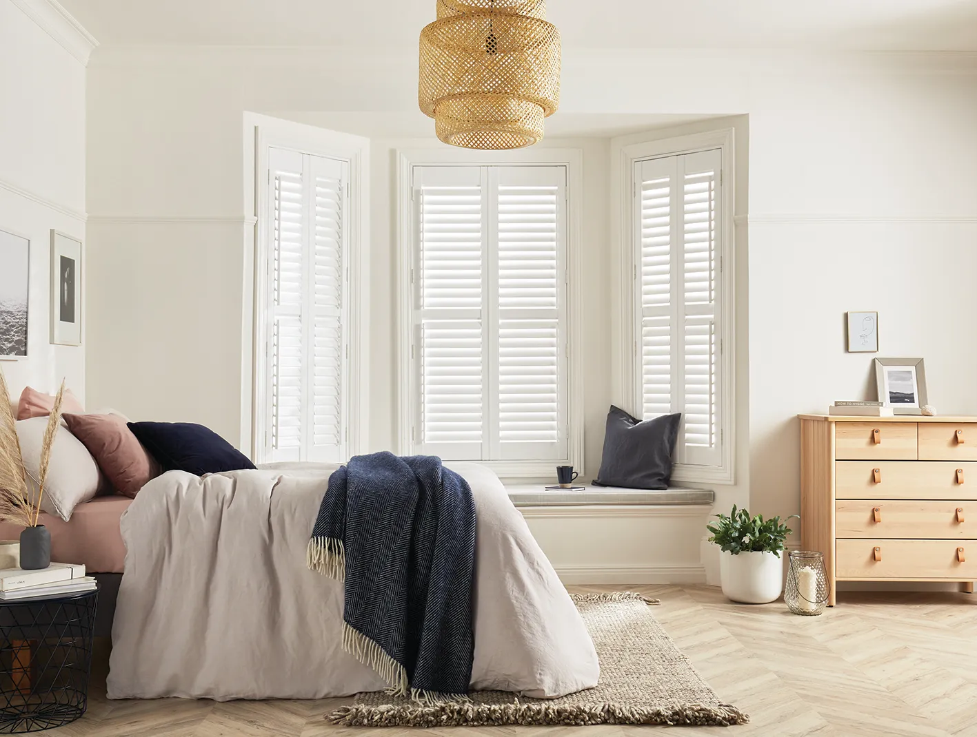 White plantation shutters in a bright home interior