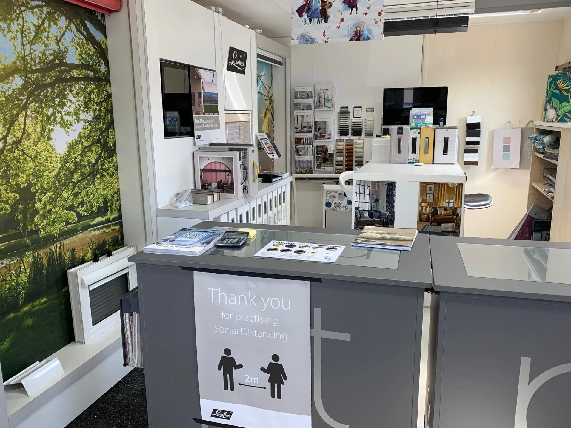Showroom consultation area with fabric and blind samples